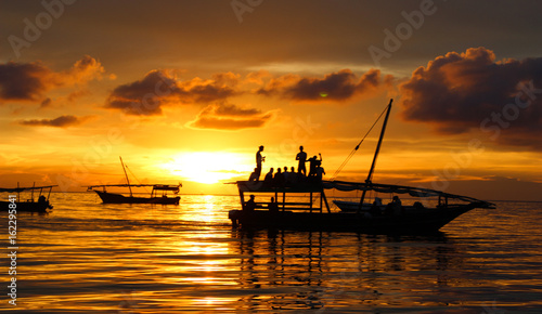 Zanzibar sunset with a boat 