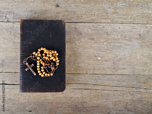 Rosary beads and breviary photo