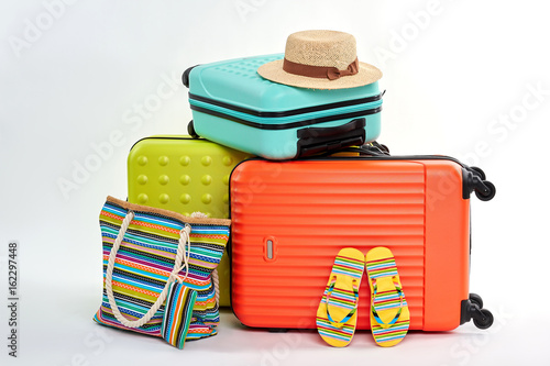 Female flips and handbag, suitcases. Accessories for beach resort. photo