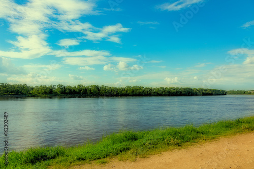 The shore of the grandiose Russian Volga river near the town of Uglich on a summer day. Yaroslavl region 