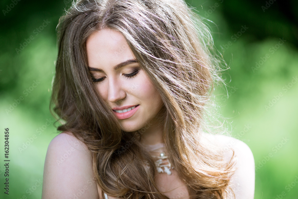 Closeup brunette bride with fashion wedding hairstyle and makeup Closeup brunette bride with fashion wedding hairstyle and makeup