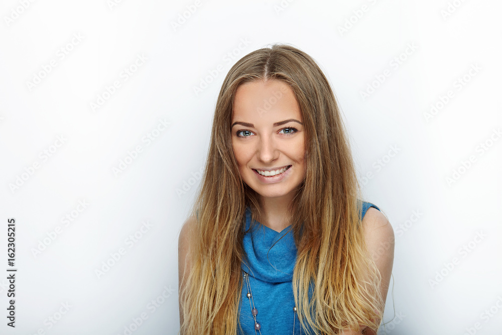 Headshot of young adorable blonde woman with cute smile on white background