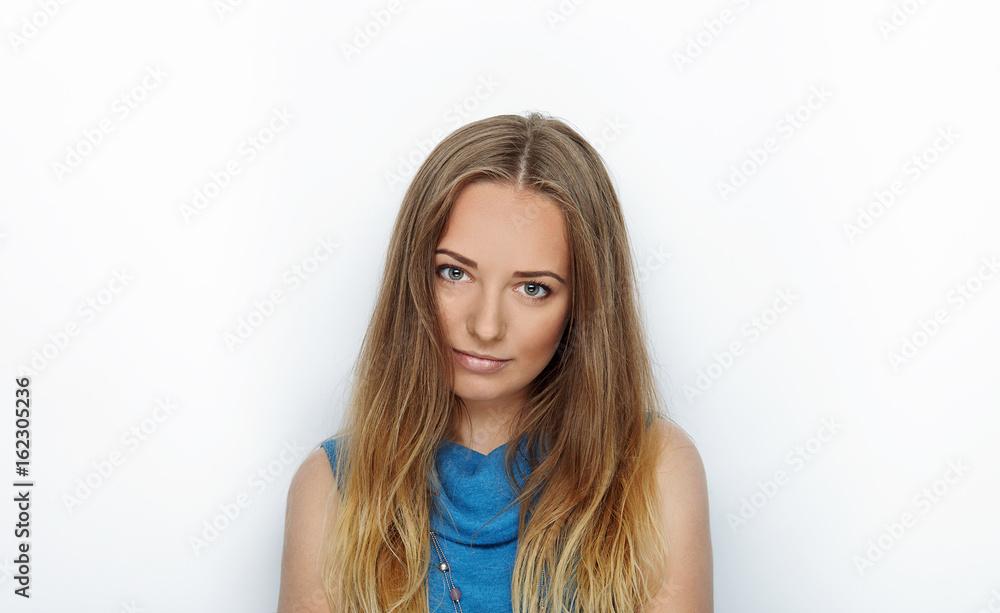 Headshot of young adorable blonde woman with cute smile on white background Headshot of young adorable blonde woman with cute smile on white background