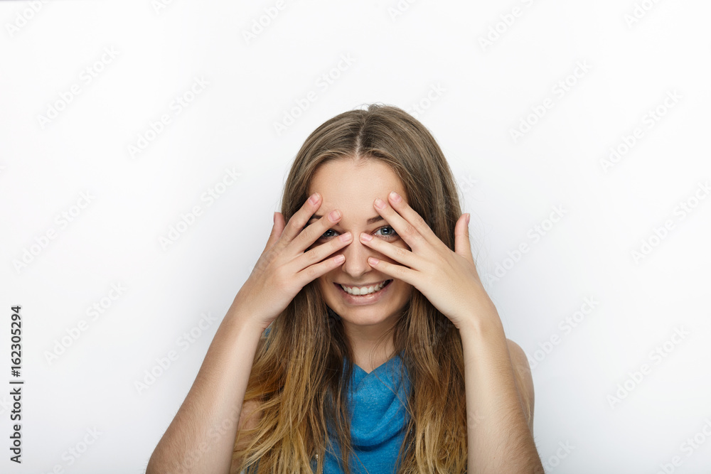 Headshot of young adorable blonde woman with cute smile on white background Headshot of young adorable blonde woman with cute smile on white background
