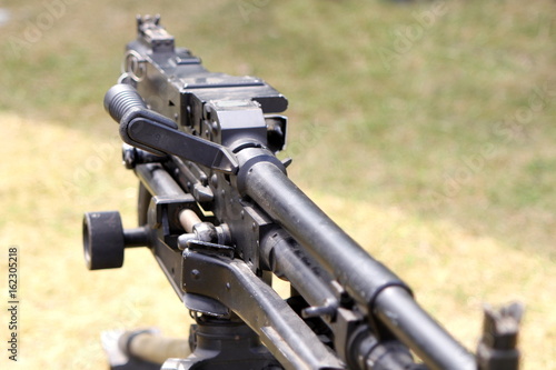 Shallow focus shot of an L7A2 GPMG "GIMPY" General Purpose Machine Gun mounted on tripod