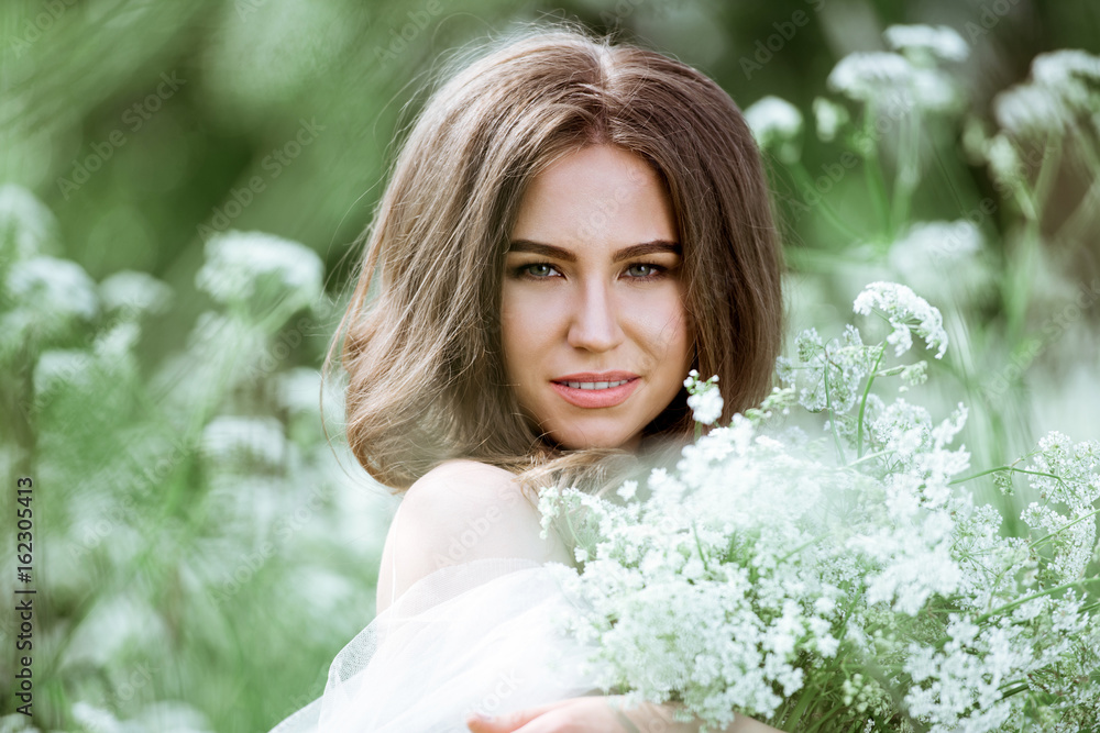 Closeup brunette bride with fashion wedding hairstyle and makeup Closeup brunette bride with fashion wedding hairstyle and makeup