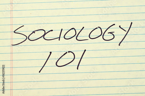 The words "Sociology 101" on a yellow legal pad
