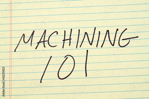 The words "Machining 101" on a yellow legal pad