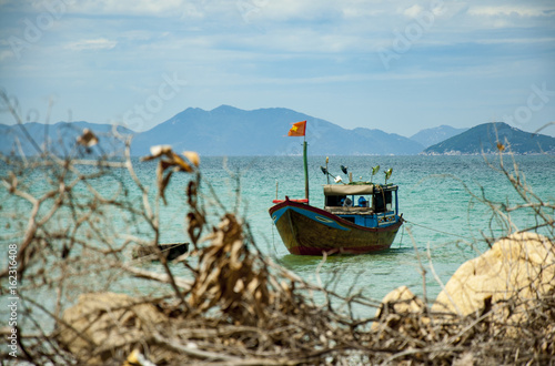 Colorful fishing boats in Vietnam  next to the fishing village.