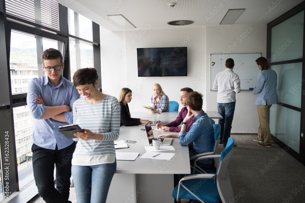 Two Business People Working With Tablet in office Two Business People Working With Tablet in office