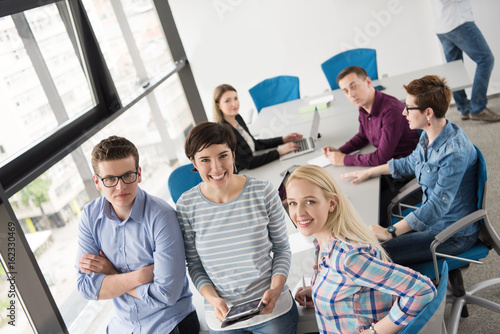 group of Business People Working With Tablet in startup office