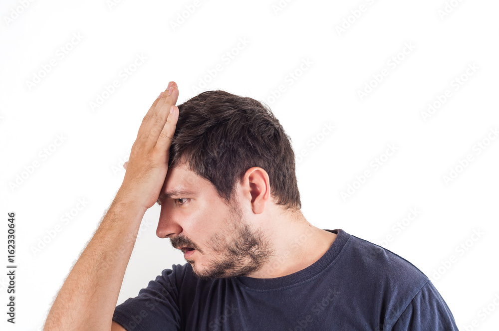 Portrait of man with facepalm emotion. Sad or getting upset man Portrait of man with facepalm emotion. Sad or getting upset man