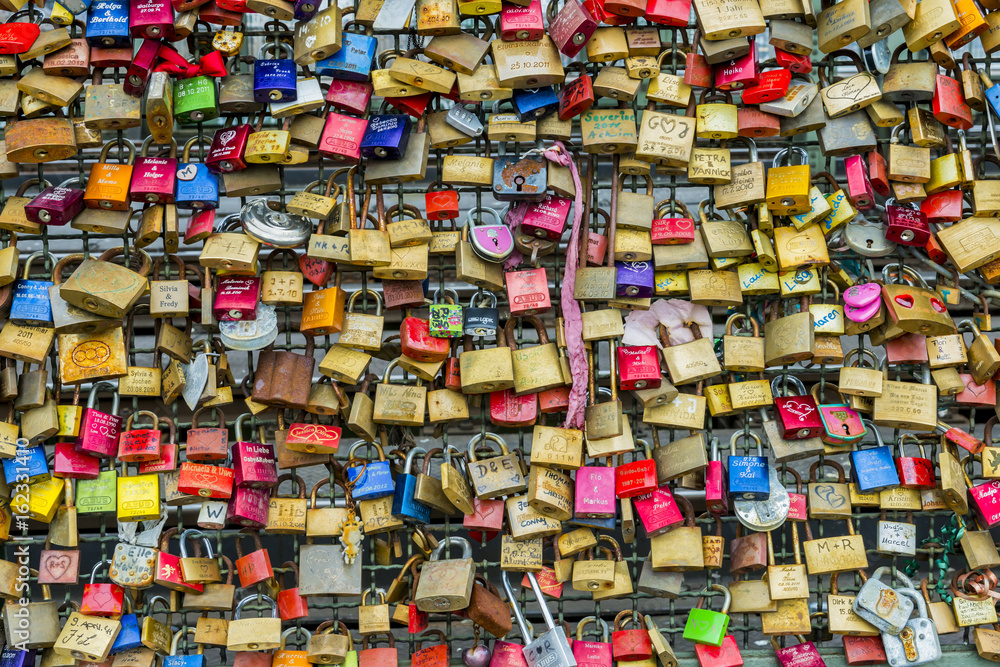 Fototapeta premium Many Padlocks on Fence on Iron Fence