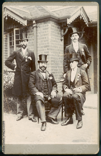 Φωτογραφία Four Men in Top Hats. Date: late 19th century