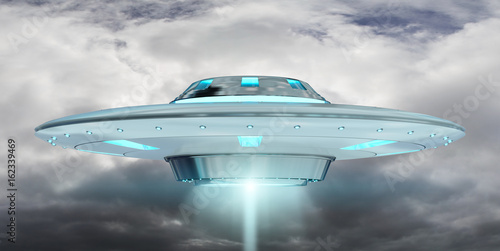 Fototapeta Naklejka Na Ścianę i Meble -  Vintage UFO flying on cloudy sky 3D rendering
