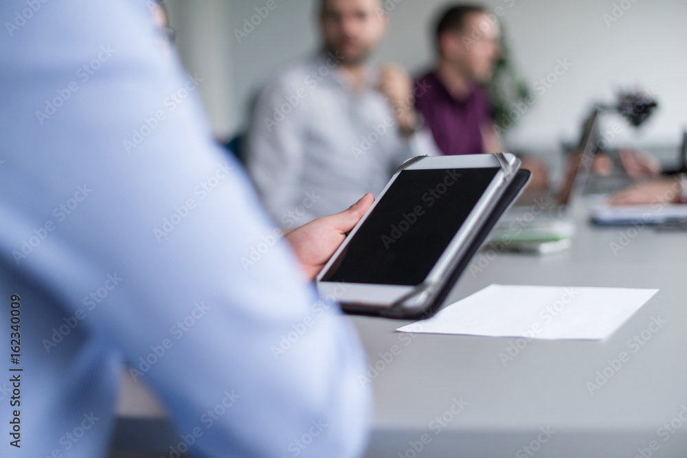 Businessman using tablet in modern office Businessman using tablet in modern office