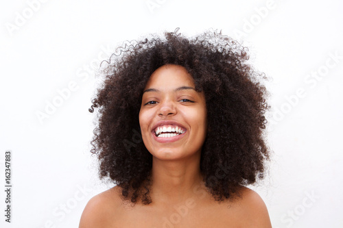 Close up cheerful african american woman with bare shoulders