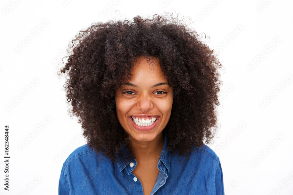 Close up laughing african american woman isolated on white background Close up laughing african american woman isolated on white background