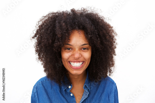 Close up laughing african american woman isolated on white background