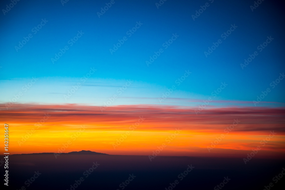 Fototapeta premium Spectacular sunset flying somewhere over Argentina