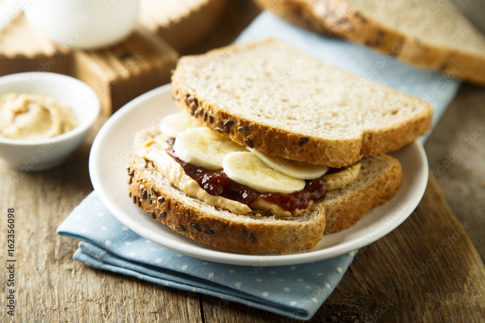 Peanut butter and jelly sandwich with banana Peanut butter and jelly sandwich with banana