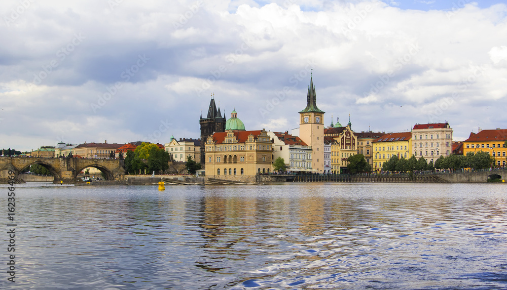 Background panoramic view of the embankment of the Vltava River from the water, Prague, Czech Republic