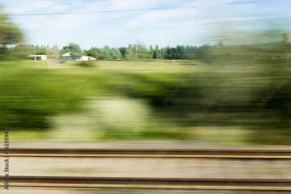 Fototapeta premium Nature in motion from the train window