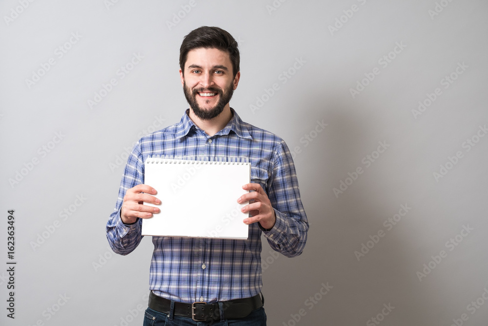 Man with textbook Man with textbook