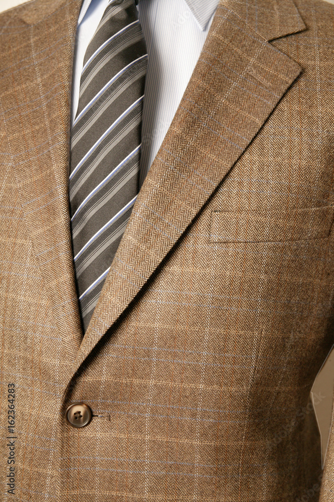 close up of man in a suit with tie and handkerchief close up of man in a suit with tie and handkerchief