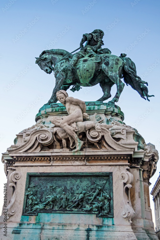 Statue of Prince Savoyai Eugen in front of the historic Royal Palace in Buda Castle. Budapest, Hungary