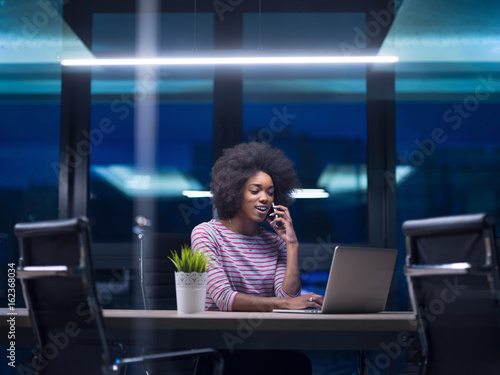 black businesswoman using a laptop in startup office