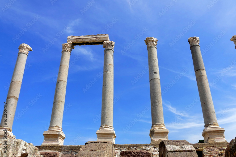 Ruins of agora in the city of Izmir. Ancient building with arches, built of stone.