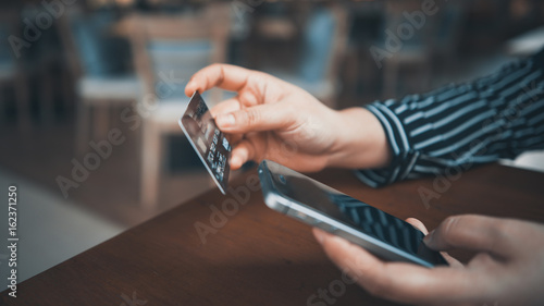 Shopping Online With Debit Card © Aris Suwanmalee