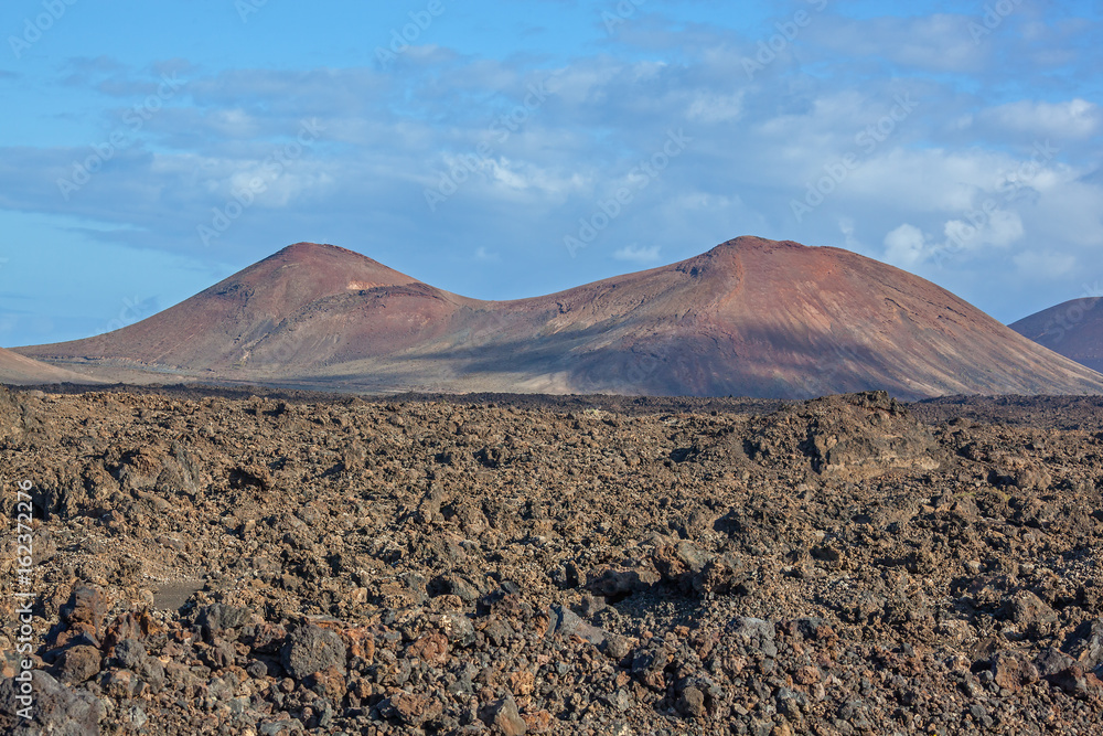 Amazing volcanic landscape in the Timanfaya national park on Lanzarote island, Canary Islands, Spain