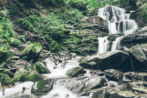 waterfal in deep forest photo