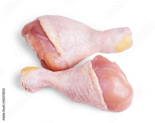 fresh chicken thighs isolated on white background