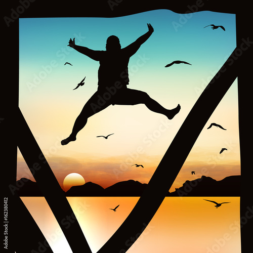 Silhouette and jumping girl in the twilight with blue sky.
