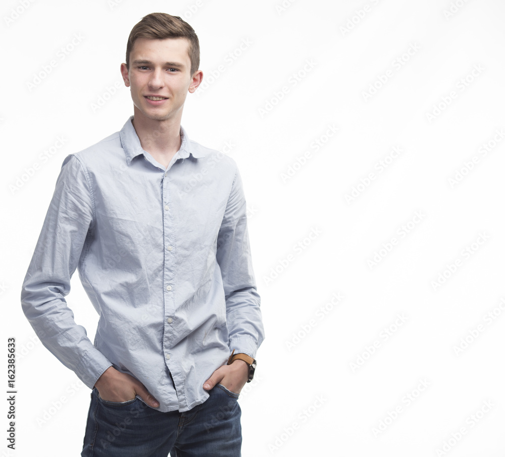 Young happy man portrait of a confident businessman on a gray background. Ideal for banners, registration forms, presentation, landings, presenting concept. Young happy man portrait of a confident businessman on a gray background. Ideal for banners, registration forms, presentation, landings, presenting concept.