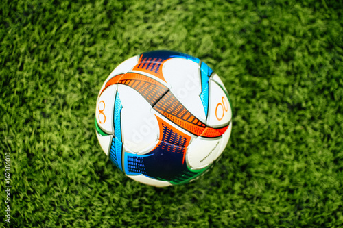 Soccer ball on grass grass on a football field