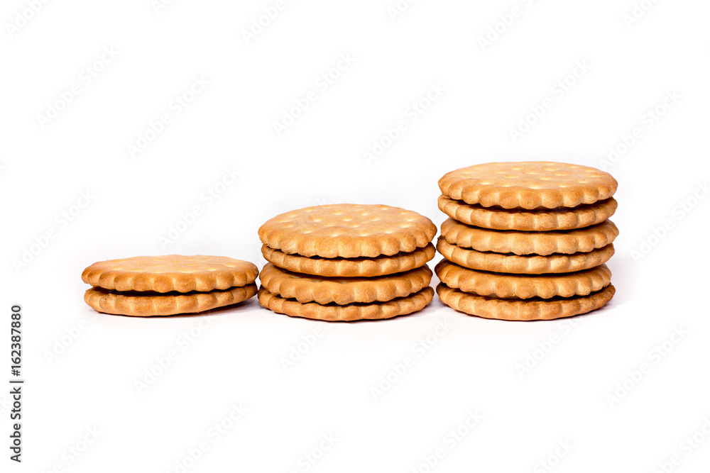 A stack of cicle biscuits puff sandwich cream isolated on white A stack of cicle biscuits puff sandwich cream isolated on white