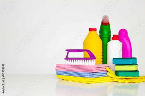 Range of cleaning products for the home. Detergents  chemical bottles  cleaning sponges and gloves. on a white background.