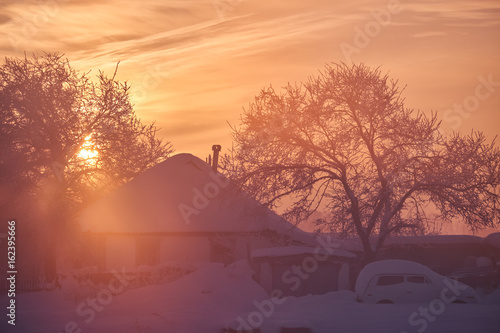 Russian  Altai village Urozhainoe  at morning time with  amazing San rays