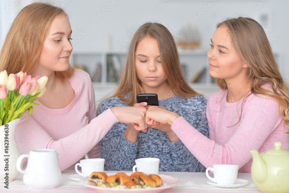 Group of teenage girls with smartphone Group of teenage girls with smartphone