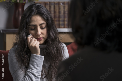 Female patient talking to her therapist