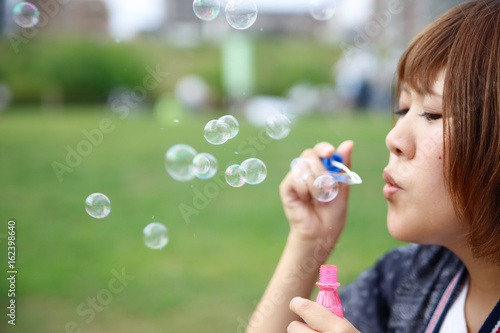 japanese young woman  soap bubble