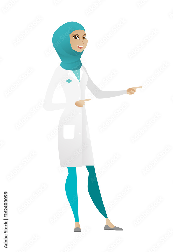 Young muslim doctor pointing to the side Young muslim doctor pointing to the side