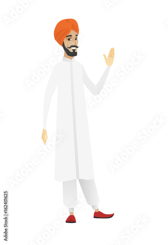 Young hindu businessman waving his hand.