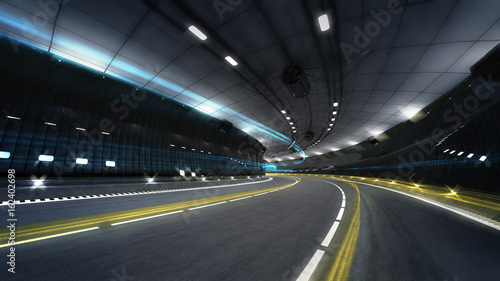 illuminated city highway tunnel with spotlights