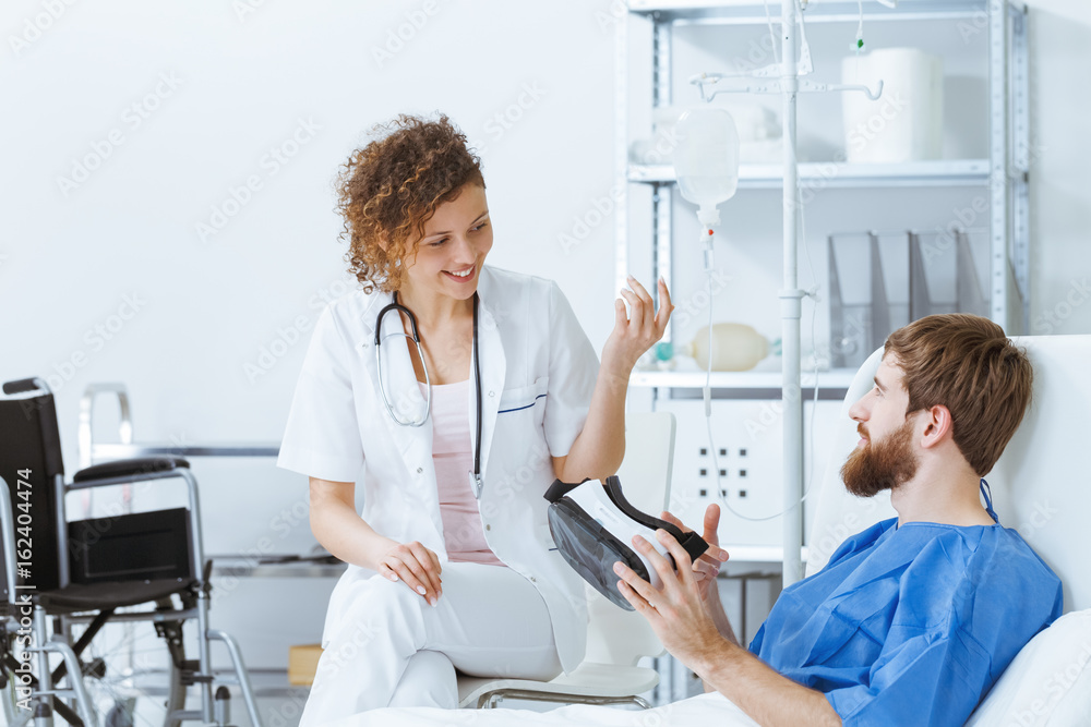 Doctor explaining VR to patient Doctor explaining VR to patient