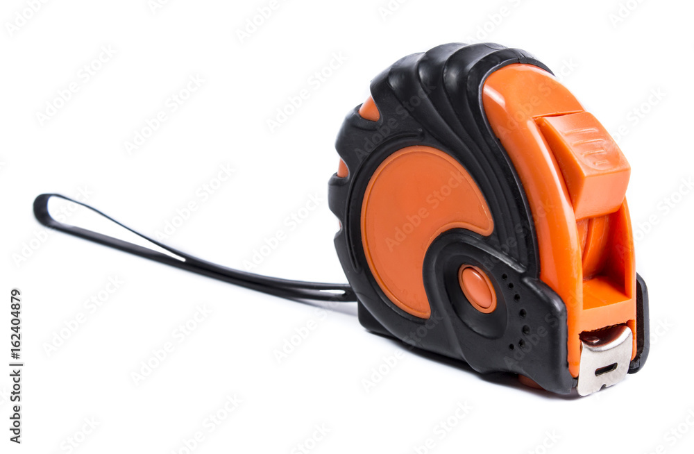 Roulette in black and orange plastic case on a white background Roulette in black and orange plastic case on a white background